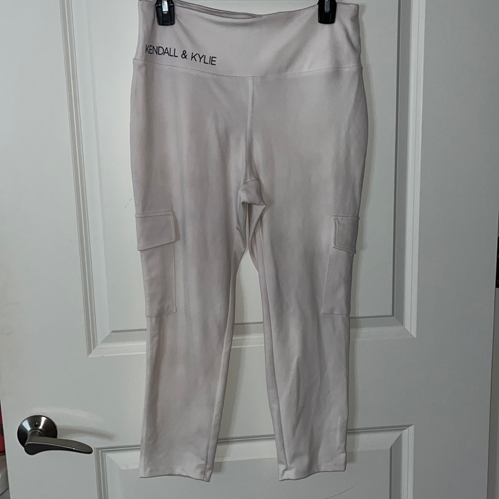 Kendall & Kylie white Capri cargo pocket leggings.